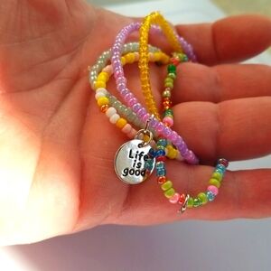 Life Is Good Charm Set of Pastel Stretch Bracelets And Confetti Colors. 7/08/107